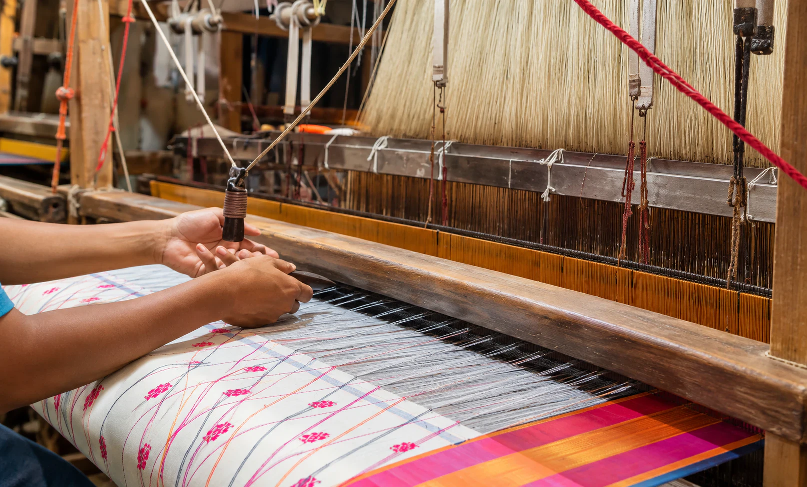 Traditional saree weaver creating handwoven silk saree